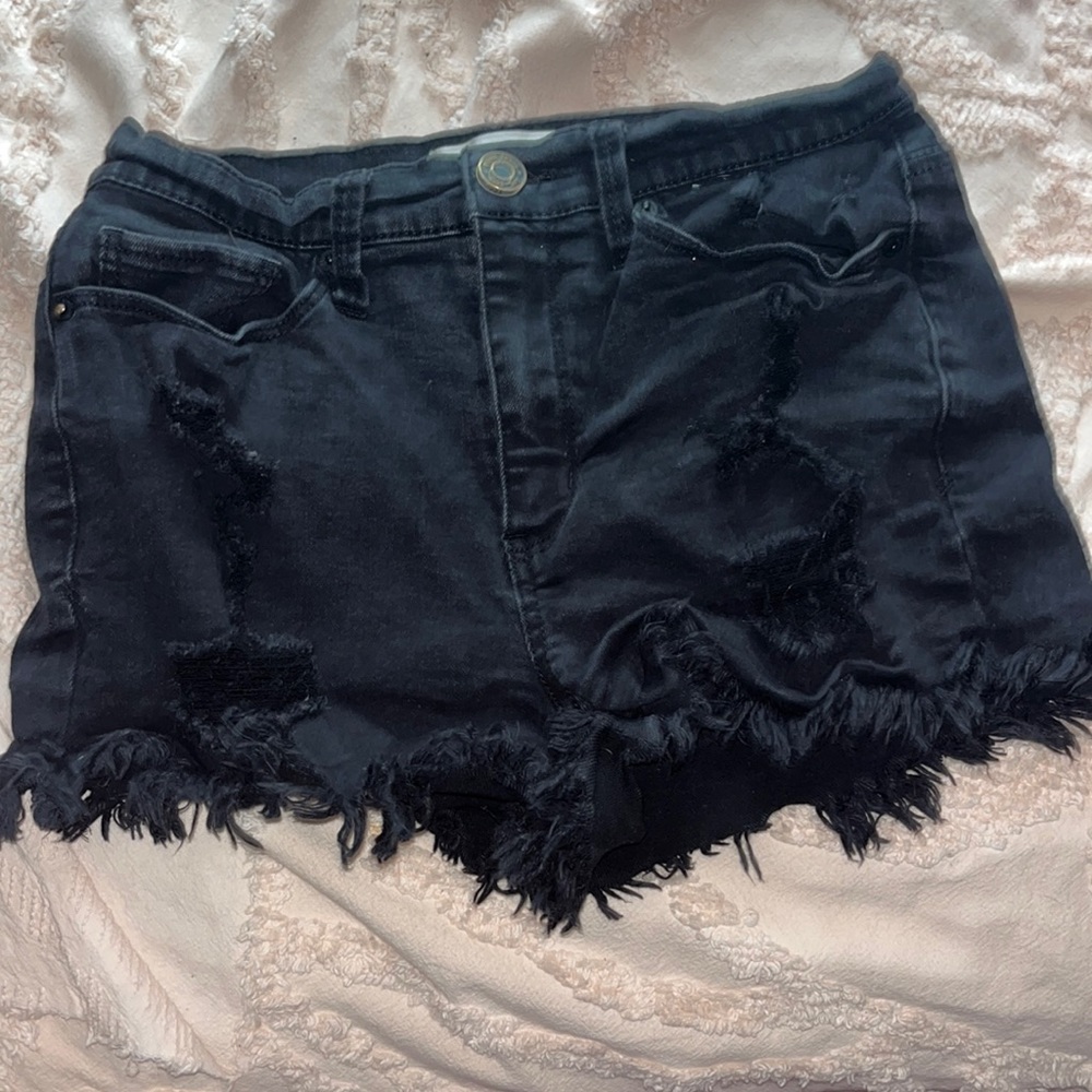 black ripped short jeans